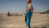 Een groep herders arriveert met hun vee in de gemeenschap van Sincaro, in de regio Sanag, waar Oxfam een ​​watervoorzieningssysteem heeft aangelegd voor mens en dier.
