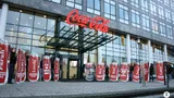 Foto van de stunt bij het hoofdkantoor van Coca-Cola Nederland.