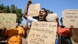 Demonstranten in Uganda strijden voor klimaatrechtvaardigheid.