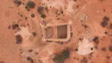 Opgedroogde waterbron in Somalië, van bovenaf gefotografeerd.
