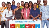 Young people from Burkina Faso with a sign about the SDG's.