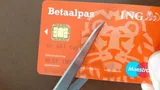 Een betaalpas van de ING wordt doorgeknipt