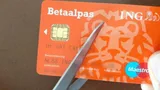 Foto van doorknippen bankpas ING met schaar