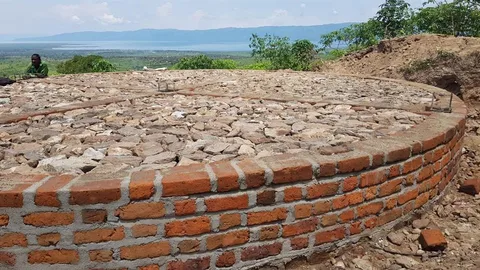 Oxfam waterleiding drc fundering opslagtank 1