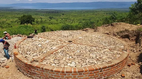 Oxfam waterleiding drc fundering opslagtank 2