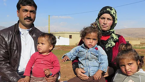 Abu Anas, zijn vrouw en zijn drie kinderen.