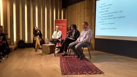 People sitting at a conference.