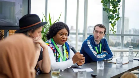 Photograph of Olivia Onyemaobi, CEO of PadUp Creations speaking at the Responsible Business Forum