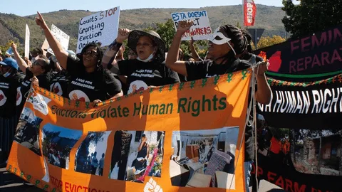 Women protesting against eviction.