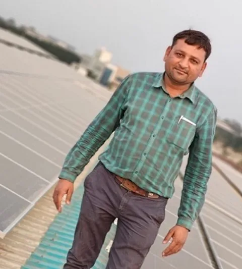 Asodariya on his solar roof top.
