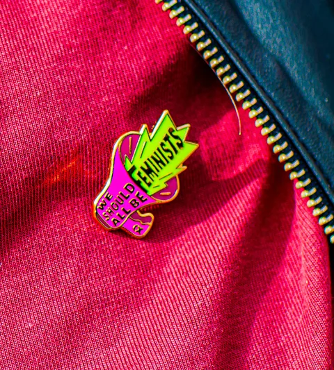 20260311 OXFAM Gender pin web RVB V1