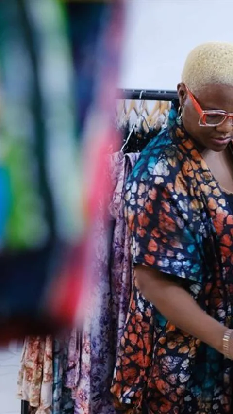 Yetunde Akande looks at a fabric